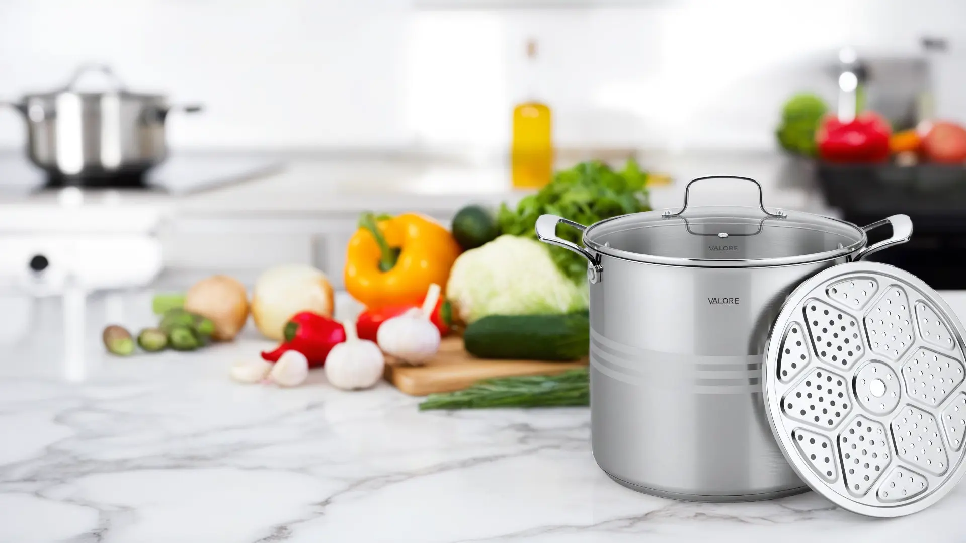 Valore stainless stock pot on a bright kitchen counter with fresh vegetables